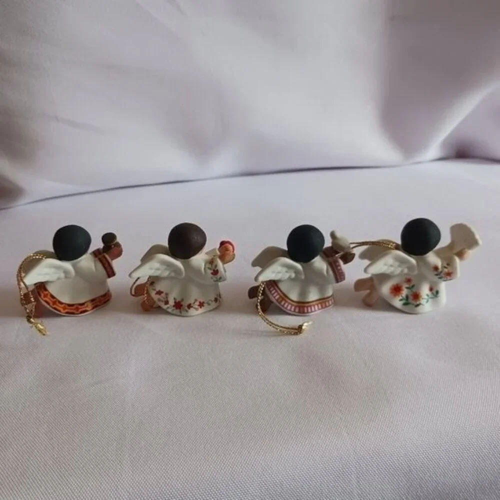 Vtg Avon peace on earth porcelain angel ornaments set of 4